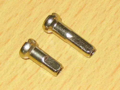 Bicycle spoke nipples showing threaded components
