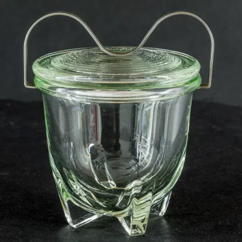 Vintage egg coddler with decorative pattern and metal screw-on lid
